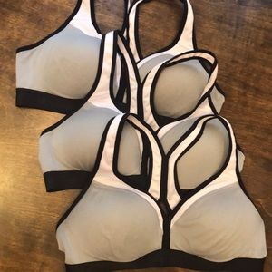 Set of three Champion Sports bras. Size large.